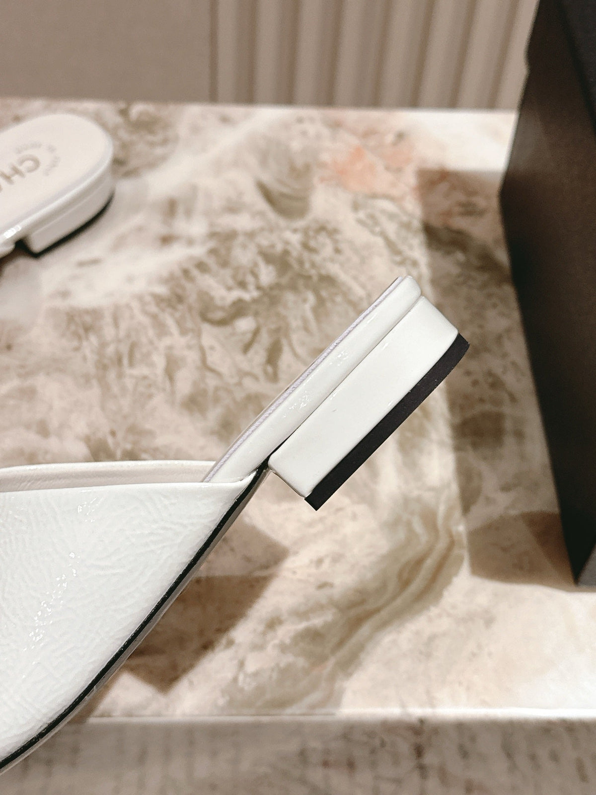 CHANEL FLAT MULES 25S IN WHITE PATENT LEATHER